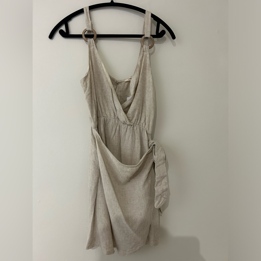 Mini to midi in length safari-esque dress